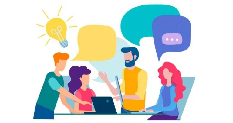 A group of people collaborating over a project. Showing communication in action.